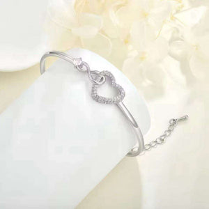 To My Daughter from Mom infinity heart bracelet in elegant packaging symbolizing unbreakable bond and love